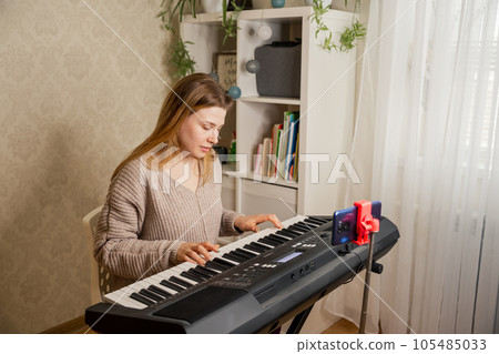 Live streaming concert. Teacher teaching to play piano online. Live streaming concert. Teacher teaching to play piano online. 105485033