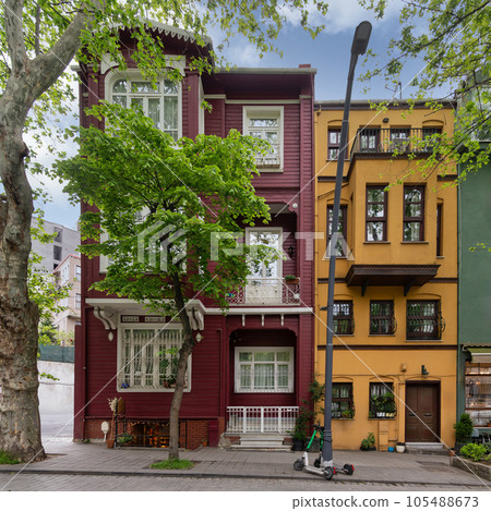 Facade of colorful wooden houses painted in red and orange, located in Kuzguncuk, Uskudar district, Istanbul, Turkey Facade of colorful wooden houses painted in red and orange, located in Kuzguncuk, Uskudar district, Istanbul, Turkey 105488673