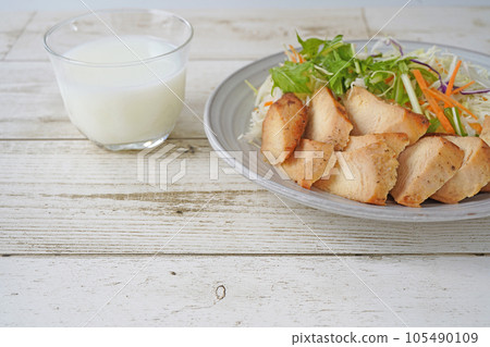 A healthy, sugar-free menu with salad, chicken, and milk 105490109