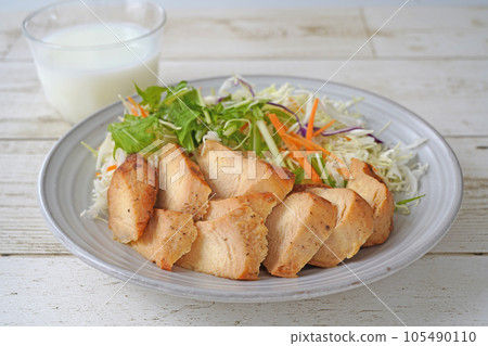 A healthy, sugar-free menu with salad, chicken, and milk 105490110