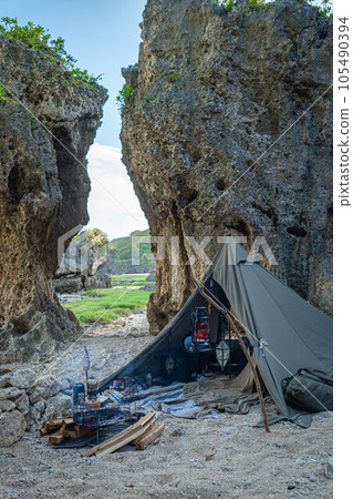 camping tent setup one person tent rugged camping nature outdoors solo camping adventure blank expression camping tent setup one person tent rugged camping nature outdoors solo camping adventure blank expression 105490394