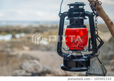 lantern camping tool camping gear outdoor antique retro sea coast copy space 105491310