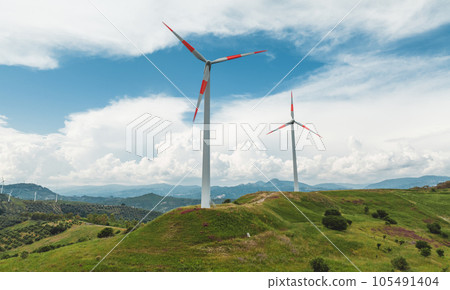 Wind turbine electric generator on the mountains Wind turbine electric generator on the mountains 105491404