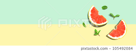 Fresh grapefruits and mints overhead view 105492084