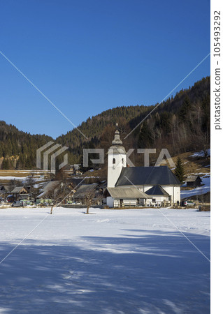 Landscape with church (Cerkev Rozenvenske Marije) near Bohinjska Bistrica, Slovenia 105493292
