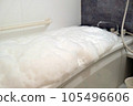 A bubble bath in a typical Japanese house that fills the bathtub with a bubble bath 105496606