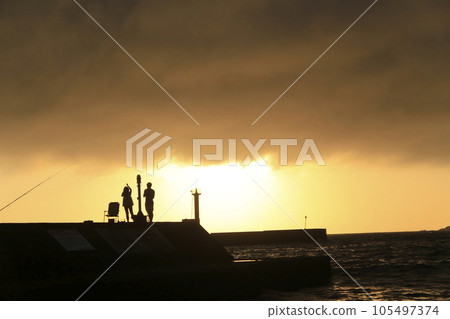 Sunset over the sea 105497374
