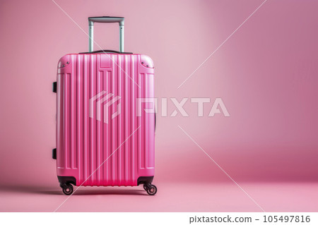 A bright pink suitcase on a bright background. Minimalism. The concept of travel. 105497816