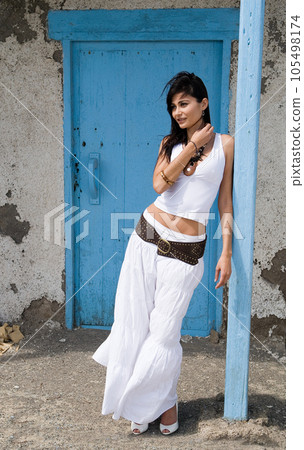 beautiful woman dressing white clothes outside beautiful woman dressing white clothes outside 105498174
