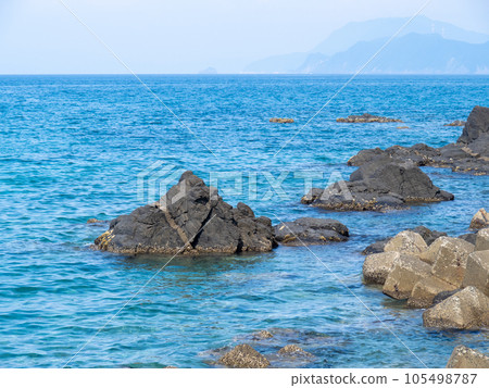 rocks and sea. Calm coast of the Sea of Japan in summer (July). rocks and sea. Calm coast of the Sea of Japan in summer (July). 105498787