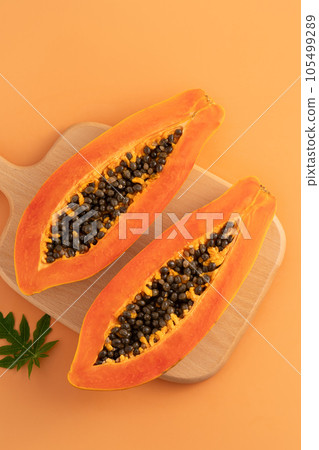 papaya fruit summer top view sliced papaya fruit 105499289