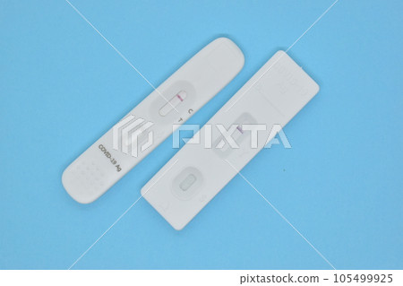 covid test kid on blue background 105499925
