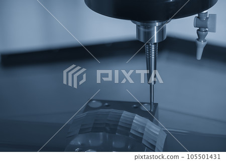 The CNC milling machine cutting mold part by solid ball end mill tool. The CNC milling machine cutting mold part by solid ball end mill tool. 105501431