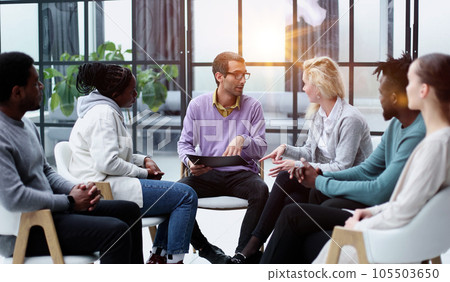 business training and coaching in the company. people sit and chat business training and coaching in the company. people sit and chat 105503650