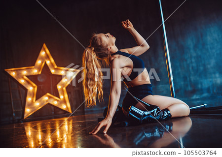 Sexy pole dancing woman Sexy pole dancing woman 105503764