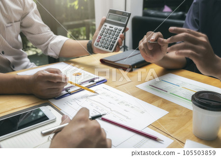 Business team meeting and discussing project plan. Businessmen discussing together in meeting room. Professional investor working with business project together. Finance managers task. 105503859