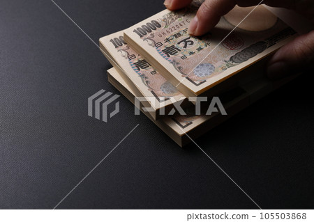Image of a wad of bills Image of a wad of bills 105503868
