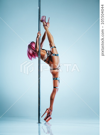 Woman poledancing Woman poledancing 105504044
