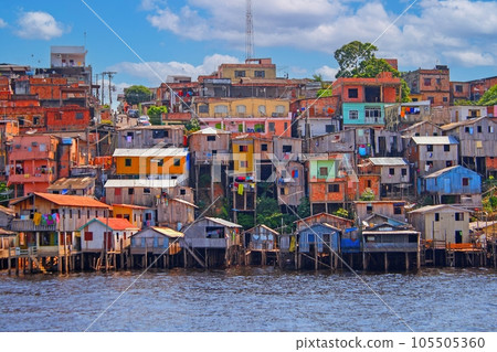 Picture of a housing estate in manaus with colorful houses taken from the Amazon River 105505360