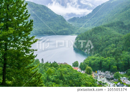 Panorama picture of Hohenschwangau castle and over Alpsee lake in Bavaria 105505374