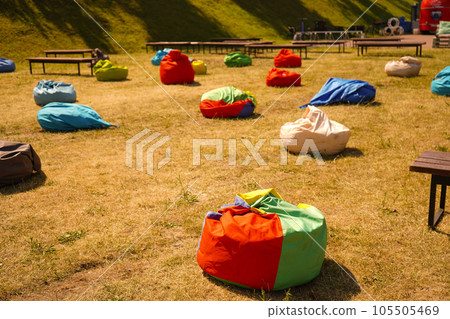 Many colorful bean chairs at the park Many colorful bean chairs at the park 105505469