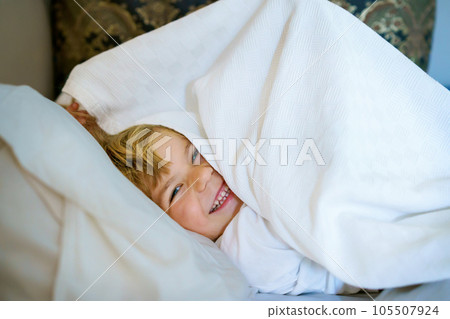 Cute Little Preschool Girl after Sleeping In Bed. Adorable Preschool Child Dreaming, Healthy Sleep Of Children By Day. Deep Sleeping Of Toddler. Kids Resting. 105507924