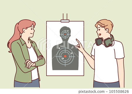 Man teaches woman to shoot at targets with rifle range of firearms for admission to police academy Man teaches woman to shoot at targets with rifle range of firearms for admission to police academy 105508626