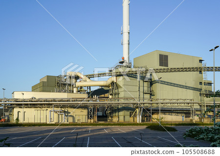 External view of equipment of large modern biomass co-generation wood chip power plant 105508688