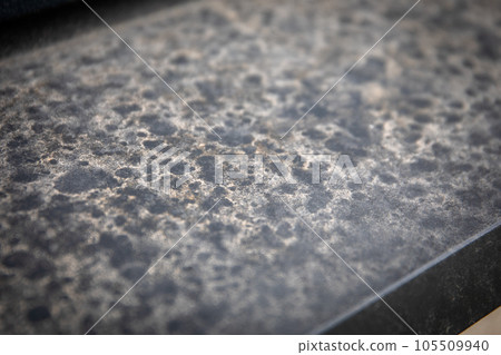 Dust and water runoff on the metal outdoor windowsill Dust and water runoff on the metal outdoor windowsill 105509940