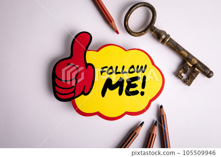 Follow Me. Sticker with text on white office table 105509946