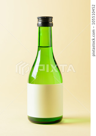 Small sake bottle with blank label (sample mockup) 105510452