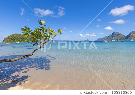 Impression of the paradisiacal Maremegmeg beach near El Nido on the Philippine island of Palawan during the day Impression of the paradisiacal Maremegmeg beach near El Nido on the Philippine island of Palawan during the day 105510500