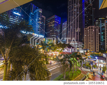 Night street scene from Eastwood neighborhood in Manila Night street scene from Eastwood neighborhood in Manila 105510651