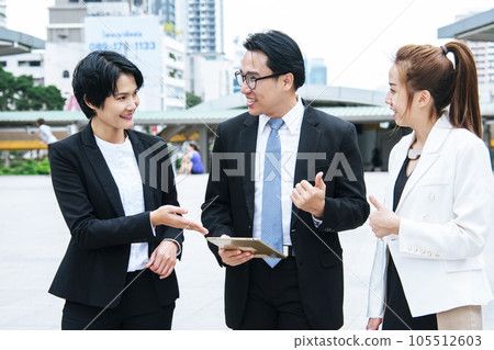 Business Woman Partner talk, meeting team Partnership in modern city together. Diversity Asian Business Partner online meeting trust teamwork. Asian Two Business people teams meeting outdoor in city. Business Woman Partner talk, meeting team Partnership in modern city together. Diversity Asian Business Partner online meeting trust teamwork. Asian Two Business people teams meeting outdoor in city. 105512603