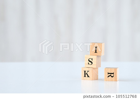 A letter block written as a crumbling risk 105512768