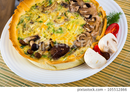Mushroom pie filled with shiitake, porcini, champignons Mushroom pie filled with shiitake, porcini, champignons 105512866