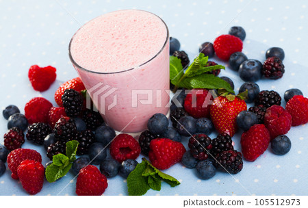 Smoothie with milk and berries 105512973