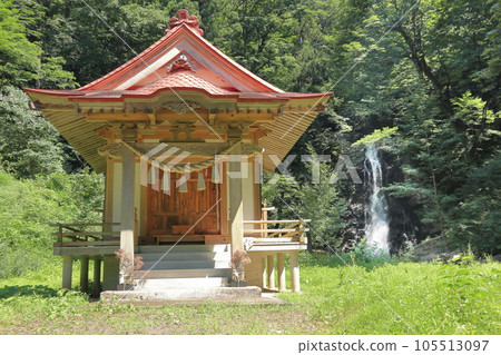 Shrine and waterfall with solemn atmosphere 105513097