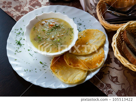 Traditional Belarusian machanka with pancakes 105513422