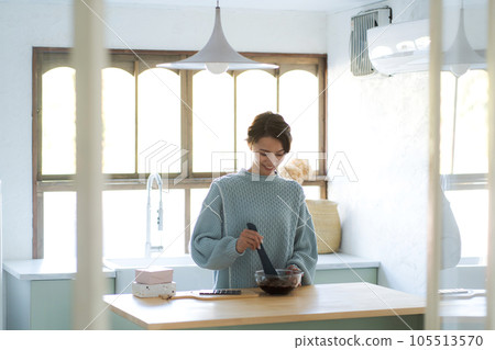 A woman making sweets A woman making sweets 105513570