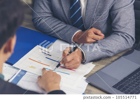 Two businesspeople meeting work at office desk. Teamwork partners team with Business strategy chart graph, infographic data financial report. Team partner planning marketing finance excel stat report 105514771