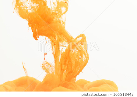 Close up of yellow ink in water with copy space on white background 105518442
