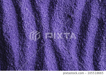 Close up of pattern of purple sand and copy space background 105518665