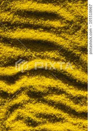 Close up of pattern of yellow sand and copy space background 105518667