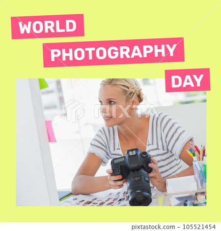 World photography day text on pink and yellow with happy caucasian woman at table holding camera 105521454