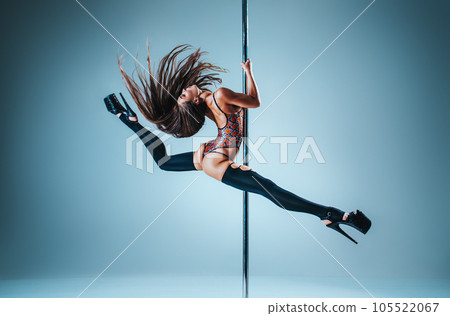 Woman pole dancing Woman pole dancing 105522067