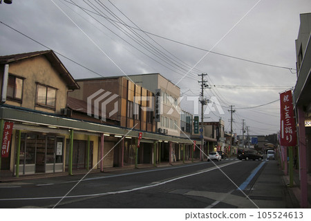 Shopping street with ganboku architecture at dusk 105524613