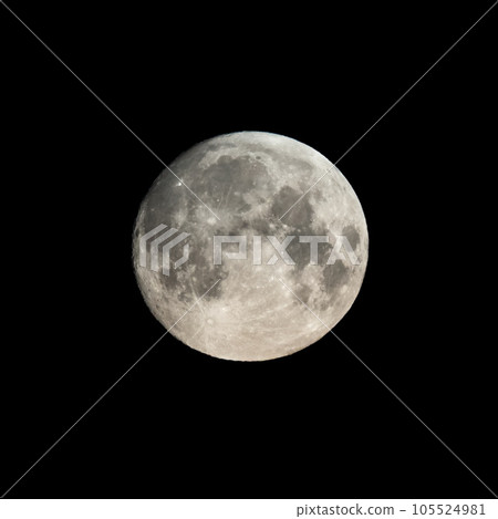 Detailed image of the full moon isolated on black. 105524981