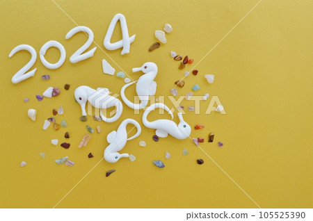 Paper clay seahorse and raw stone New Year's card material Paper clay seahorse and raw stone New Year's card material 105525390