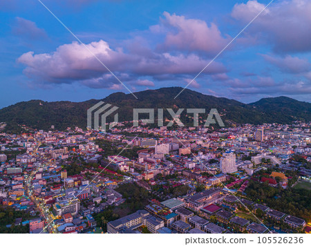 The sky changes color from yellow to red as the sun sets over the sea..sunset landscape amazing light of nature cloudscape sky. .Big sun and red lighting sky background. 4k resolution 105526236